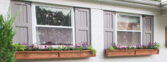 Double hung windows with box planters