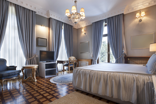Cream walls with Blue Curtains