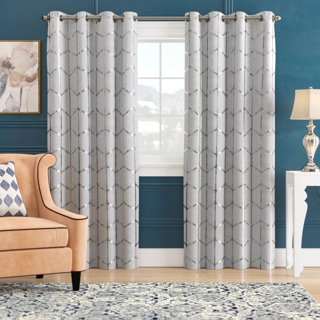 Blue walls with White Patterned Curtains