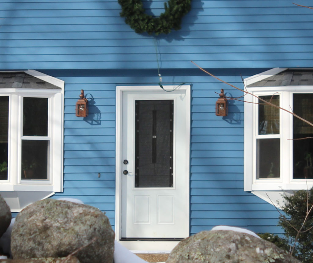 white front door for blue house