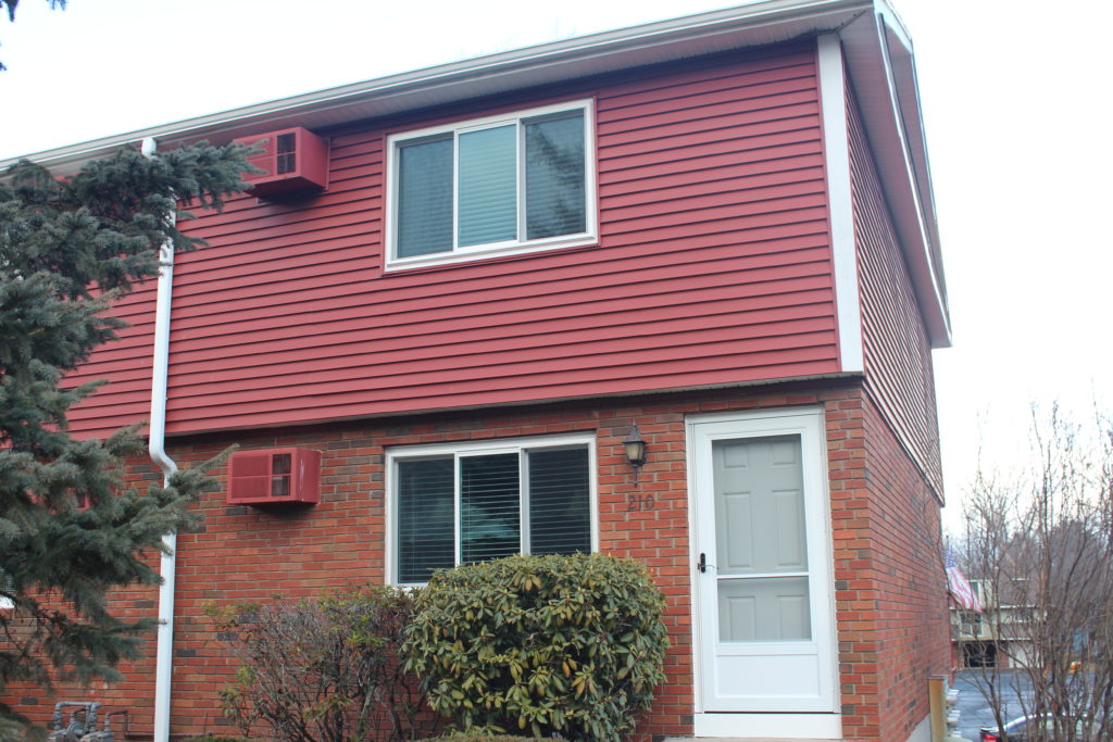 white front door for red house