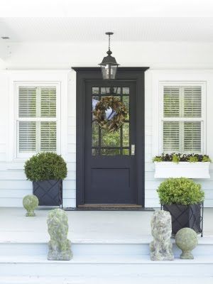 Smooth 24 gauge black colored steel door.
