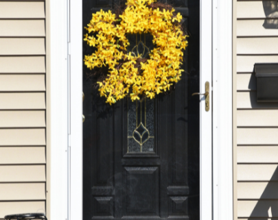 Yellow wreath on storm door